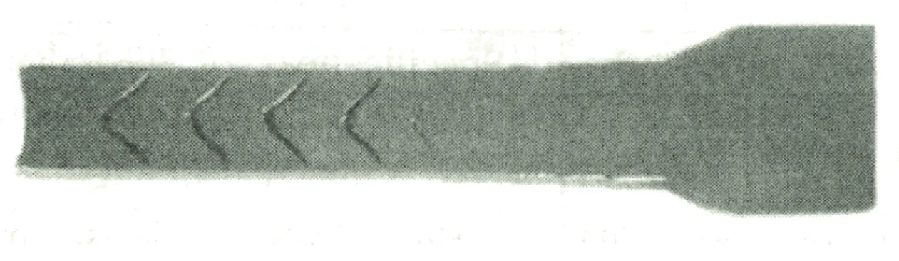 Fig. 1-5 Appearance of chevron cracks in cold multi stage extrusion  1-7)