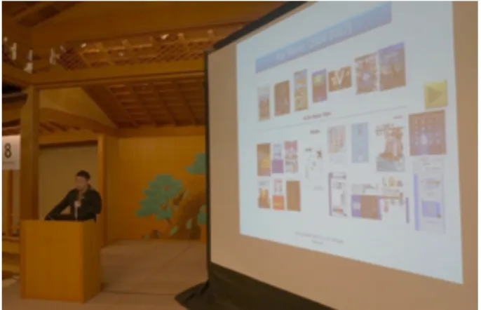 図 8 Youichiro Miyake 氏の基調講演の様子 た．「ゲーム中のキャラクターが周囲の状況に応じて次の 動作を決定する」 「格闘ゲームのキャラクターが学習を重ね て強くなる」などの具体的な事例が多数紹介された．格闘 ゲームの例では，はじめのうちは手も足も出なかったキャ ラクターが，学習を重ねるごとにどんどん強くなり，最終 的には相手を圧倒する様子が紹介され，会場は驚きに包ま れた．また，必ずしも計算の結果最適と判断された行動を 取ればよいとは限らず，プレイするユーザーが楽しめるか どうかを考慮し