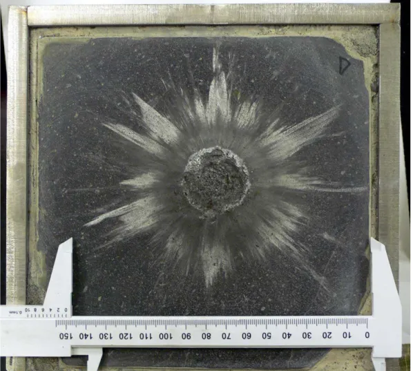Figure 2.2: Impact crater formed on the surface of the basaltic andesite target.
