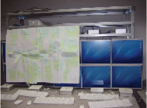 図 2 計算機 10 台を用いた KUSANAGI のハードウェアと模造紙 Fig. 2 Hardware of KUSANAGI using 10 computers and A0 sized paper.