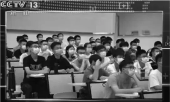 Figure  2.  A  student  receiving  their  Wuhan  University health code