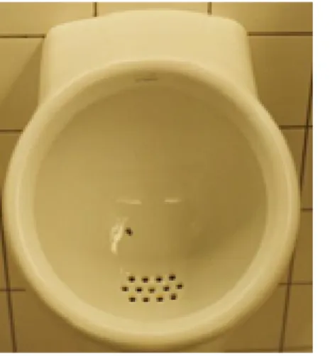 図 １- １アムステルダム・スキポール空港の男子トイレ 　 　  ( 出所 ) URINAL.NET (2002) より引用　 第 ２ 節 ナ ッ ジ の 手 法 　 ナ ッ ジ の 背 景 に あ る の は 「リ バ タ リ ア ン ・ パ タ ー ナ リ ズ ム」 で あ る。「選 択 の 余 地 を 残 し な が ら も、 よ り よ い 方 向 に 誘 導 す る こ と４ 」 を 指 す。 日 本 語 で は 「 緩 や か な 介 入 主 義 」 と 訳 さ れ る５ 。 ナ ッ ジ は、 