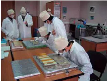 Fig. 11 Removal of the MPAC&amp; SEED #3 from the ISS  by an astronaut, who is visible on the right
