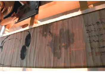 Fig. 1.6.3  旧裏打ち紙除去（ 2 層目増裏紙）