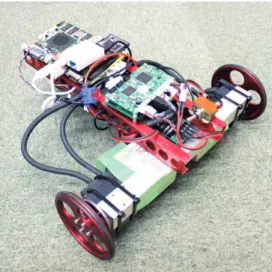 図 9: オリエンタルモータのブラシレスモータを用いた移動ロボットの例 1 MOTOR_PHASE 3.00000000 # 2 TORQUE_FINENESS 0.00000100 # 3 COUNT_REV 400.00000000 #[cnt/rev] 4 VOLT 24.00000000 #[V] 5 CYCLE 0.00100000 #[s] 6 GEAR 5.00000000 #[in/out] 7 MOTOR_R 0.80000000 #[ohm] 8 MOTOR_TC 0.01527887 