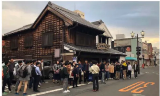 図 6 常総市まちづくりシンポジウム（2019 年 2 月＠茨城 県常総市） 筑波大学の社会工学専攻でのリカレント教育について お話をいただいた．地域の持続性ある専門的人材を掲 げていることもあり，常総市に大いに貢献できると強 く思い，庁内選抜試験に応募し選出された． 4.2 次世代モビリティ 研究テーマは，進化するモビリティ技術を組み込ん だ実行可能な先進政策を提示することにある．人口減 少によって地方自治体の財政がひっ迫することも懸念 されていることから，各自治体の面積と人口から公用 車の適切な台数を推