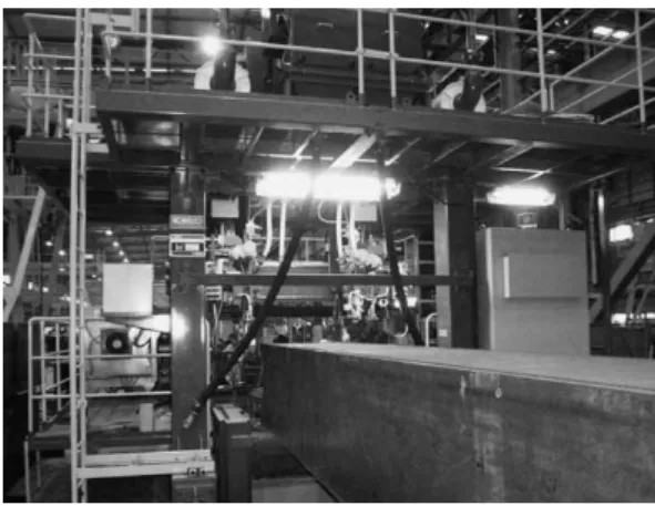 Fig. 9  Exemplary  appearance  of  welding  equipment  of  4-side  box pillar