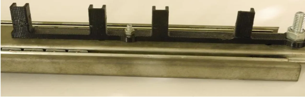 Fig. 6-6  治具をスライドレールに固定した状態 