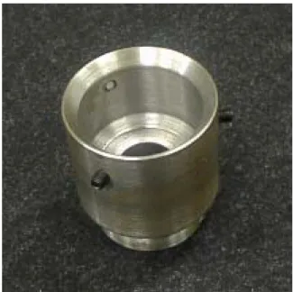Figure 2.15  Cylindrical coupling for driving work  ８）環境変化の影響  測定環境に変化が起こると，それは測定誤差の原因となる．本測定機ではレ ーザ測長機を用いてタンジェント方向の変位を測定しているため，気温・気圧・ 湿度の変化が測定誤差の原因となる．  また，環境温度による測定機や被測定歯車の膨張なども考えられる．特に， 被測定歯車の熱膨張は基礎円直径が変化することになるため，留意する必要が ある．測定実験に用いている被測定歯車の材質は SCM415 で