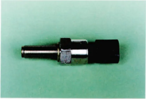 Fig. 8 General photograph of combustion pressure sensor.