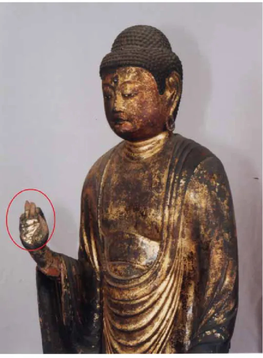 図 6  右手部分の損傷（赤丸印） 
