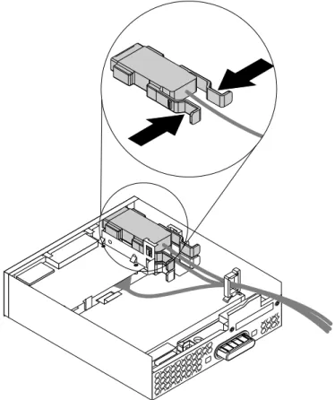 図 51. フレックス・モジュールの eSATA コネクターまたは IEEE 1394 コネクターの取り外し