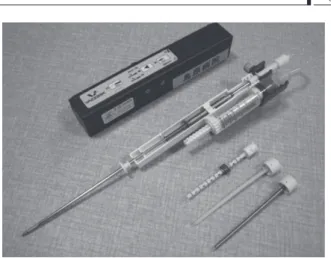 Fig. 2  Driver, biopsy probe, coaxal cannula, plastic stylet  and titanium stylet.