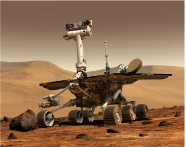 図 1.1: Mars Exploration Rover A（MER-A）[2] 1.2 目的 本研究では，内界センサのみから得られた情報を利用して，未知環境においても適切な 行動を獲得することのできるシステムの開発を目的とする．これにより，従来の外界セン サを搭載したロボットが外乱の影響によって行動が困難となるような状況下でも，安定し て利用可能なシステムの設計例を示すことができると考えられる． 本研究で提案するシステムでは，適切な行動の獲得のために強化学習を利用する．その 際，行動に対する適切な報酬を