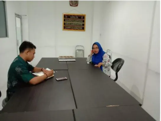 Foto  dokumentasi  bersama  Ibu  Eka  selaku  marketing    PT  BPRS  Aman  Syariah  Lampung  