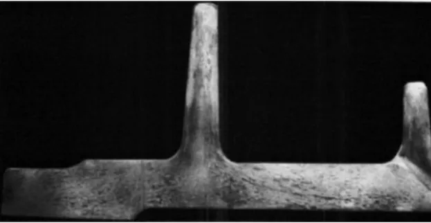 Fig. 2.2 Directions of grain fl ow in a closed-die forging