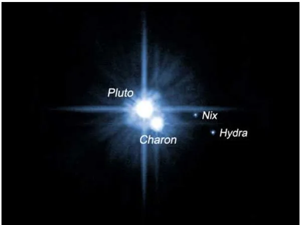 Gambar 3.  Hasil pemotretan Pluto dan Charon. 