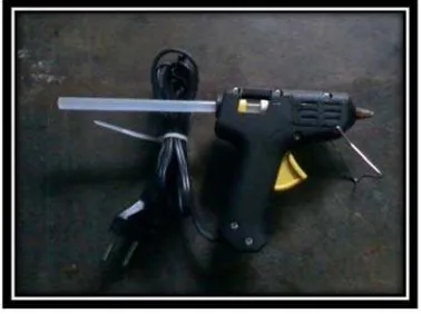 Gambar XLIX : Alat Lem Tembak (Glue Gun) 