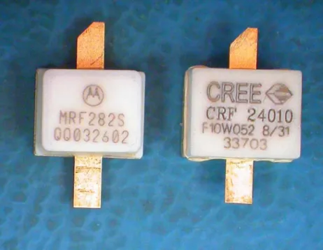 Figure 6.1. Photos of two 10W L-band power transistors: Freescale MRF282S Si LDMOS  (left) and Cree CRF 24010 SiC MESFET (right)
