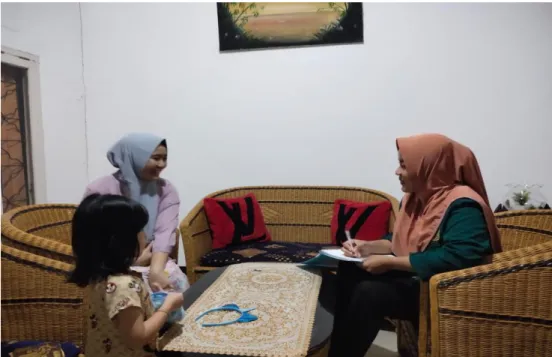 Foto peneliti dengan Junita Erfiani Selaku Kakak dari Fadilla Syahdina  komunitas CRF Raflesia Owner Team Kota Bengkulu 