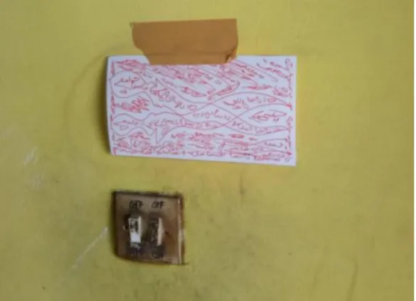 Fig. 2. Isim is taped to the wall of a warehouse. 
