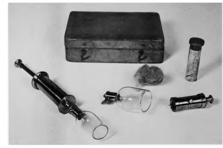 FIGURE 98.—An artificial leech. Note the three blades on  the scarificator that simulate the triangular puncture of  the leech