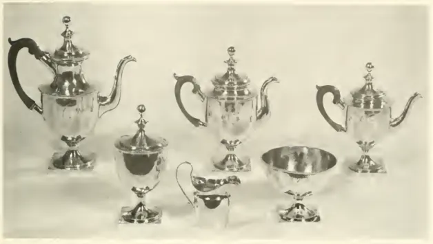 Figure 1 1 . — Silver tea set consisting of teapot, sugar bowl, container for cream or milk, and waste bowl, made by John McMuUin, of Philadelphia, about 1800