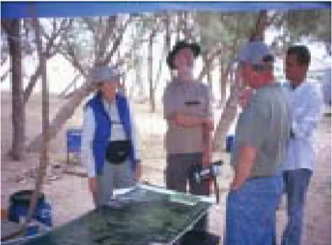 FIgure 4: Bruno Frolich explains mound survey program to Ambassador Pamela Slutz, Ron Deutsh