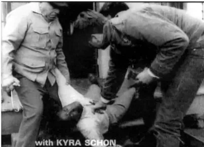 Figure 4.1 Ben’s body is thrown on the ﬁre under the end credits of Night of the Living Dead.
