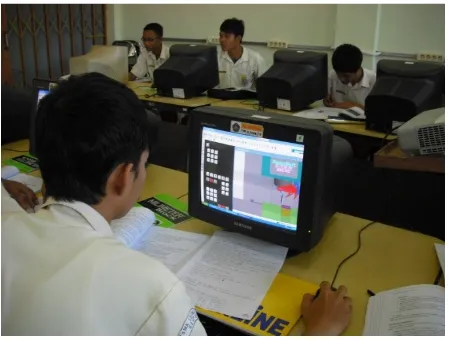 Figure  4.  Vocational  High  School  studentslearn CNC with virtual CNC machineReferences