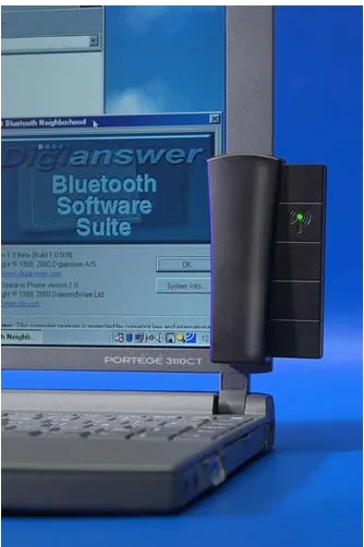 Figure 5.5: Digianswer’s Bluetooth USB adapter, mounted on a notebook PC (Photo courtesy  Digianswer A/S)  