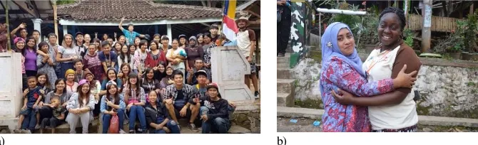 Fig.  1 a) A group of COP participants 2016 who was placed at Gumeng village had a photo session with the villagers and b) Ms