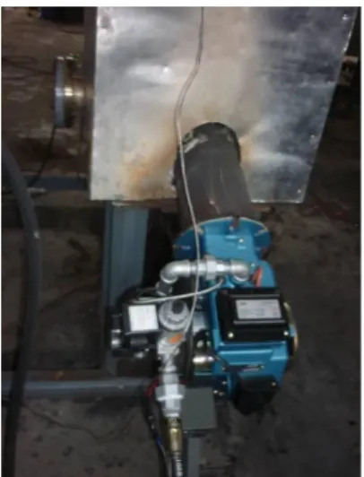 Gambar 11. Instalasi burner LPG dan sistem termostat pada pipa lorong api 