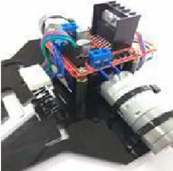 Gambar 15. Pemasangan motor dan baterai pada body robot 