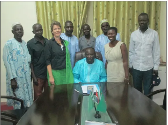 Figure 4.  Representatives of NASCOM, DoFish, the USAID/BaNafaa Project, and USAID/WestAfrica with the Minister of Fisheries and Water Resources following signature of the Sole Co-Management Plan amendment.