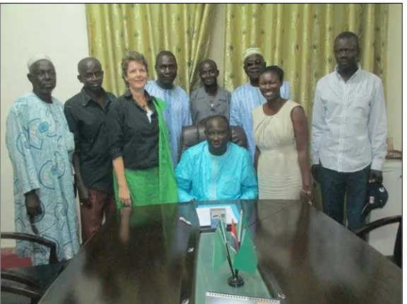 Figure 4.  Representatives of NASCOM, DoFish, the USAID/BaNafaa Project, and USAID/West Africa with the Minister of Fisheries and Water Resources following signature of the Sole Co-Management Plan amendment
