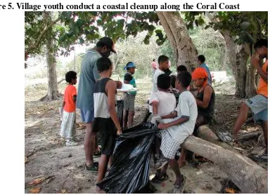 Figure 5. Village youth conduct a coastal cleanup along the Coral Coast
