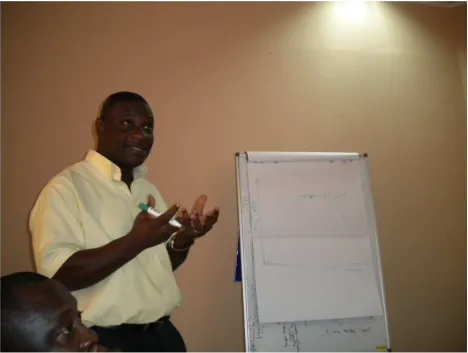 Figure 3 Director of the Hen Mpoano Initiative educating the Fisheries Working Group 