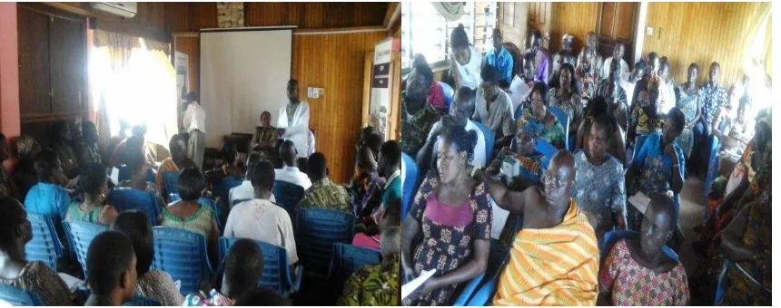 Figure 3: Hon. DCE for Ellembelle delivering a message at phase one Town-hall meeting with a section of participants listening attentively
