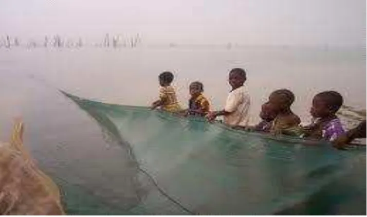 Figure 2 Children hauling heavy net 