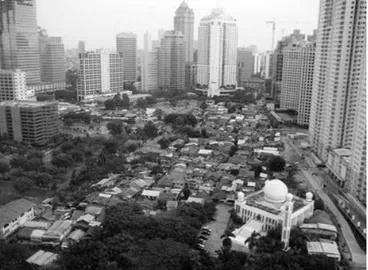 Gambar  1.  Gambar  ilustrasi  perkampungan  kota  yang  diapit  oleh deretan bangunan tinggi