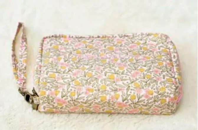 Gambar 2.8 Dompet Khakikakiku 