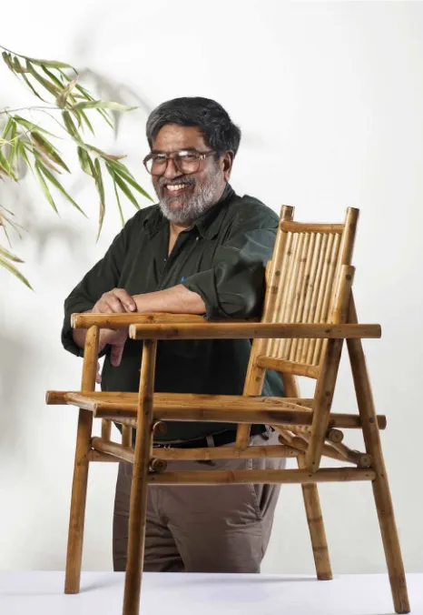 Figure 7M.P. Ranjan with the Katlamara bamboo chair designed by him.Courtesy of Aditi Ranjan.