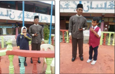 Gambar 2 & 3: Murid menunjukkan keyakinan ketika bercerita di hadapan perhimpunan 