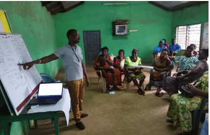 Figure 5: Participants being taken through the cost of the Dzidedi oven 