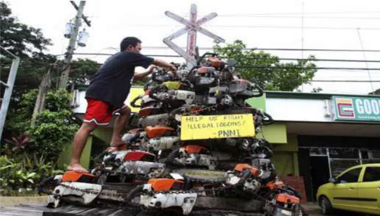 Figure 14. Campaign against illegal logging by displaying chainsaws (Philippines 2002) 
