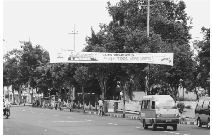 Figure 11. An Indonesian-language banner announcing the opening of the Osing Kids Tent Cafés