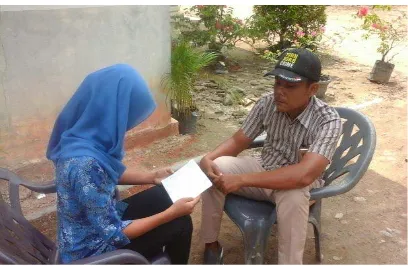 Gambar 7: Wawancara dengan ibu bendahara Desa Sei Sentosa Kecamatan Panai Hulu Kabupaten Labuhanbatu 