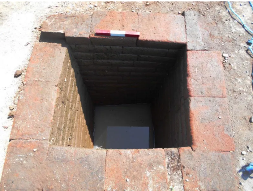 Fig. 4: Medieval rectangular  brick-walled well south-east of  Kumitir village. Note the high  groundwater level at about 1.5  m below the surface (© Arnoud  Haag).