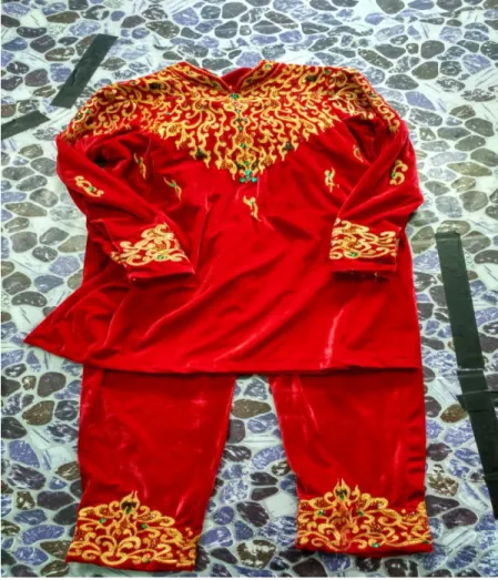 Gambar Baju dan celana untuk penari Tari Ranup Lampuan. 